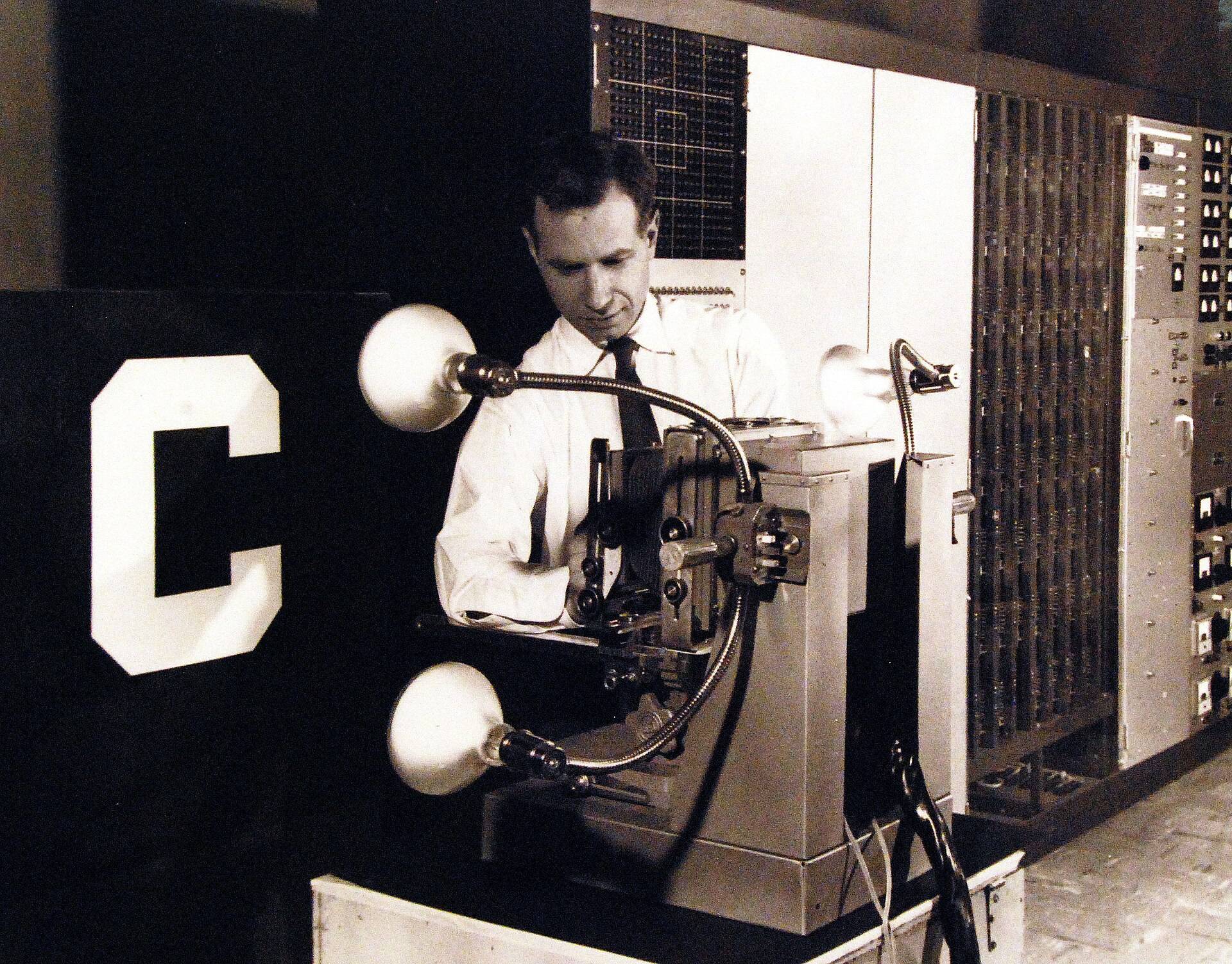 The Mark I Perceptron, a cabinet of wiring and a camera-like sensor array, photographed for a 1960 U.S. Navy press release
